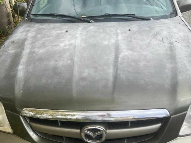 Зелений Мазда Трибьют, об'ємом двигуна 2 л та пробігом 358 тис. км за 3800 $, фото 12 на Automoto.ua