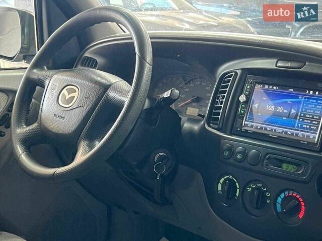 Зелений Мазда Трибьют, об'ємом двигуна 2 л та пробігом 358 тис. км за 3800 $, фото 3 на Automoto.ua