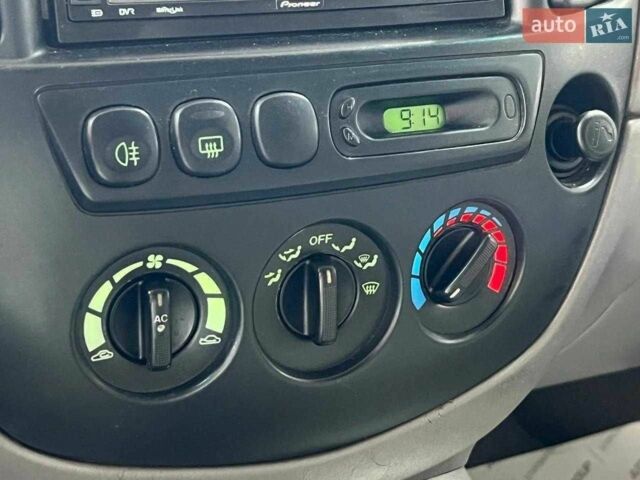 Зелений Мазда Трибьют, об'ємом двигуна 2 л та пробігом 358 тис. км за 3800 $, фото 11 на Automoto.ua