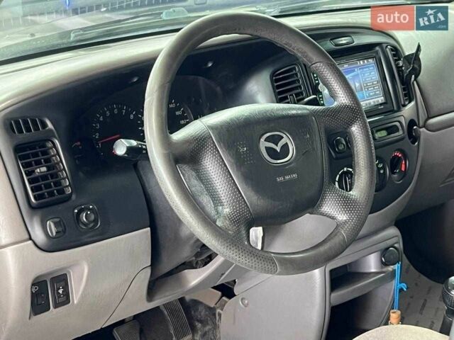 Зелений Мазда Трибьют, об'ємом двигуна 2 л та пробігом 358 тис. км за 3800 $, фото 8 на Automoto.ua