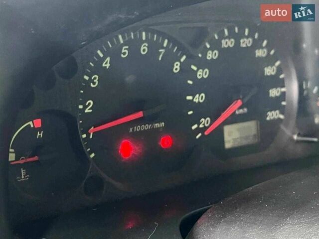 Зелений Мазда Трибьют, об'ємом двигуна 2 л та пробігом 358 тис. км за 3800 $, фото 6 на Automoto.ua