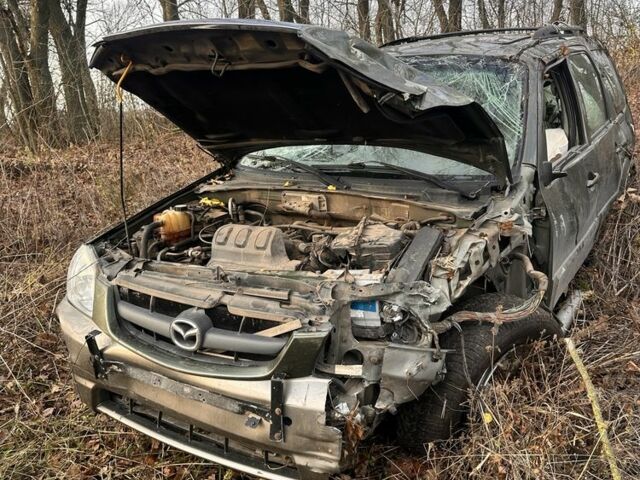 Зеленый Мазда Трибьют, объемом двигателя 3 л и пробегом 219 тыс. км за 2000 $, фото 3 на Automoto.ua