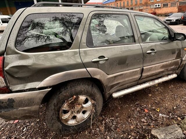 Зеленый Мазда Трибьют, объемом двигателя 3 л и пробегом 219 тыс. км за 2000 $, фото 2 на Automoto.ua