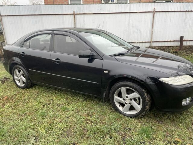 Чорний Мазда Кседос 6, об'ємом двигуна 2 л та пробігом 340 тис. км за 2999 $, фото 4 на Automoto.ua