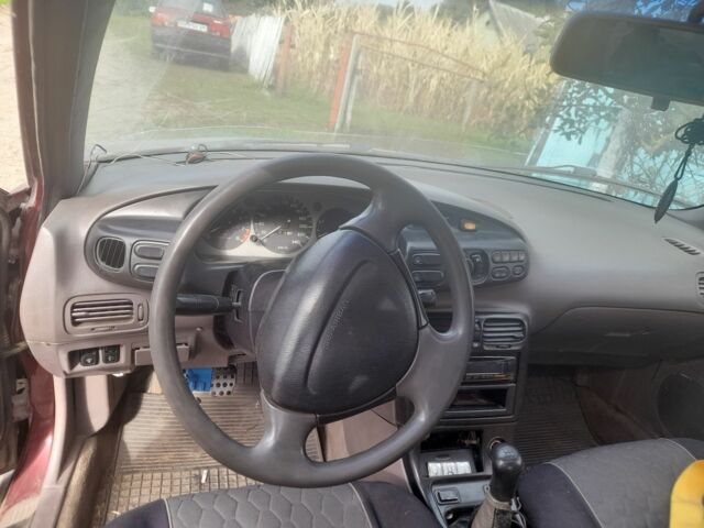 Красный Мазда Кседос 6, объемом двигателя 2 л и пробегом 300 тыс. км за 900 $, фото 1 на Automoto.ua