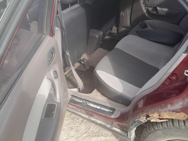 Красный Мазда Кседос 6, объемом двигателя 2 л и пробегом 300 тыс. км за 900 $, фото 2 на Automoto.ua