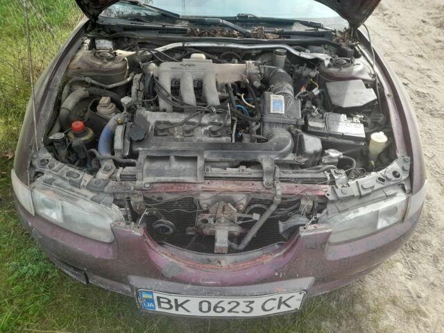 Красный Мазда Кседос 6, объемом двигателя 2 л и пробегом 300 тыс. км за 900 $, фото 3 на Automoto.ua