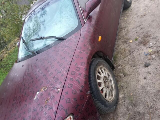 Красный Мазда Кседос 6, объемом двигателя 2 л и пробегом 300 тыс. км за 900 $, фото 4 на Automoto.ua