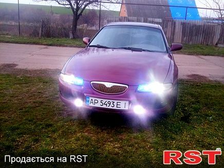 Червоний Мазда Кседос 6, об'ємом двигуна 2 л та пробігом 0 тис. км за 2700 $, фото 2 на Automoto.ua