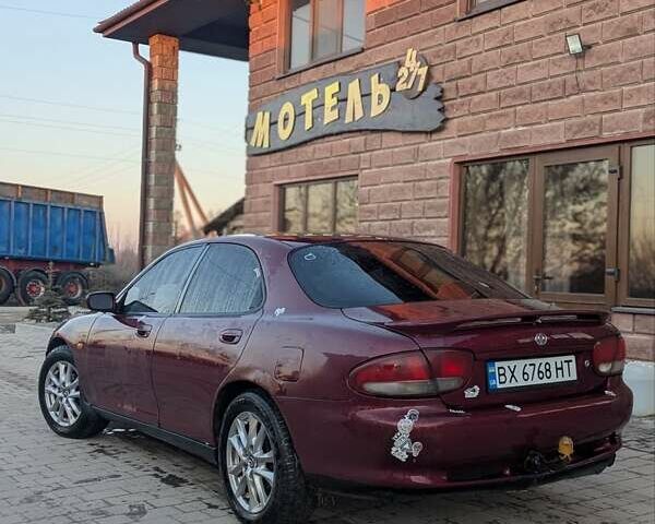 Красный Мазда Кседос 6, объемом двигателя 1.99 л и пробегом 490 тыс. км за 1200 $, фото 7 на Automoto.ua