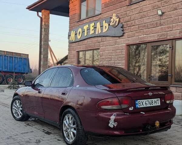 Красный Мазда Кседос 6, объемом двигателя 1.99 л и пробегом 490 тыс. км за 1200 $, фото 10 на Automoto.ua