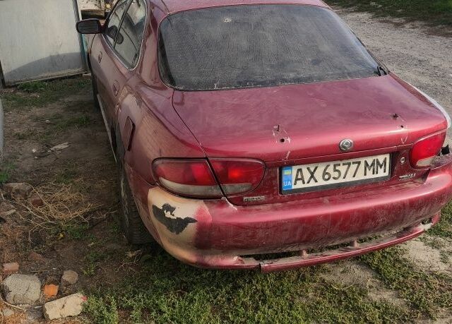 Червоний Мазда Кседос 6, об'ємом двигуна 2 л та пробігом 424 тис. км за 700 $, фото 4 на Automoto.ua