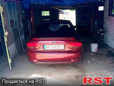 Червоний Мазда Кседос 6, об'ємом двигуна 2 л та пробігом 0 тис. км за 2700 $, фото 1 на Automoto.ua