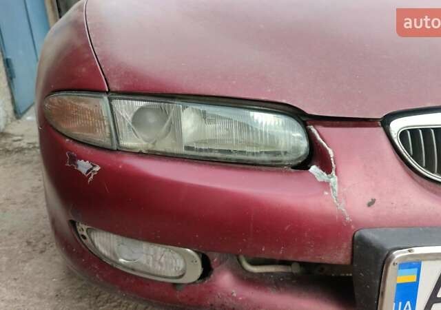 Червоний Мазда Кседос 6, об'ємом двигуна 2 л та пробігом 422 тис. км за 2300 $, фото 4 на Automoto.ua