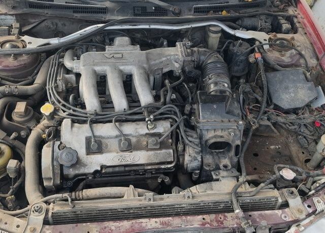 Червоний Мазда Кседос 6, об'ємом двигуна 2 л та пробігом 424 тис. км за 700 $, фото 6 на Automoto.ua