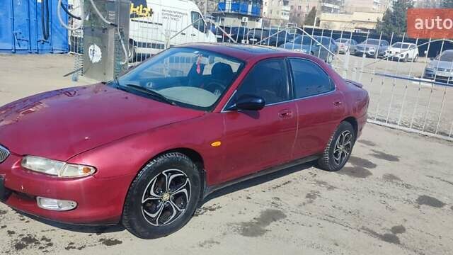 Червоний Мазда Кседос 6, об'ємом двигуна 2 л та пробігом 422 тис. км за 2300 $, фото 3 на Automoto.ua