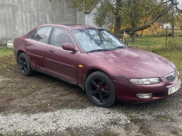 Красный Мазда Кседос 6, объемом двигателя 2 л и пробегом 350 тыс. км за 1200 $, фото 1 на Automoto.ua