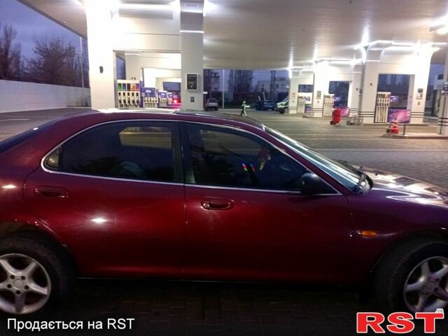 Красный Мазда Кседос 6, объемом двигателя 1.6 л и пробегом 265 тыс. км за 2500 $, фото 3 на Automoto.ua