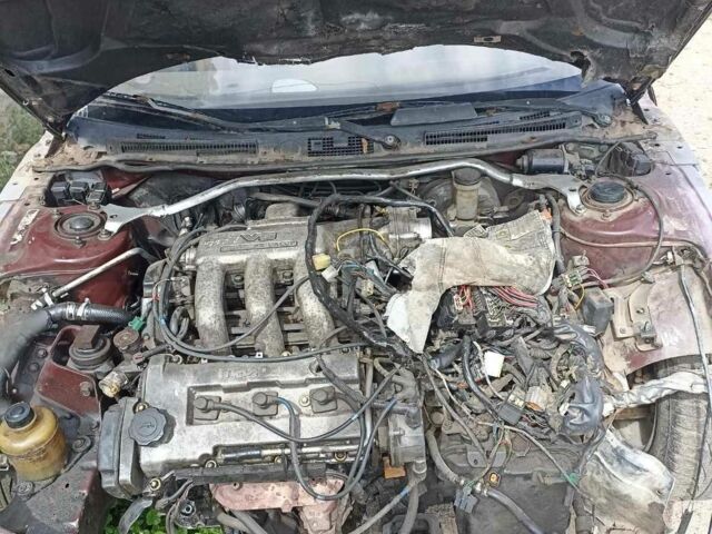 Красный Мазда Кседос 6, объемом двигателя 0 л и пробегом 300 тыс. км за 547 $, фото 6 на Automoto.ua