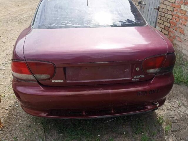 Красный Мазда Кседос 6, объемом двигателя 0 л и пробегом 300 тыс. км за 547 $, фото 5 на Automoto.ua