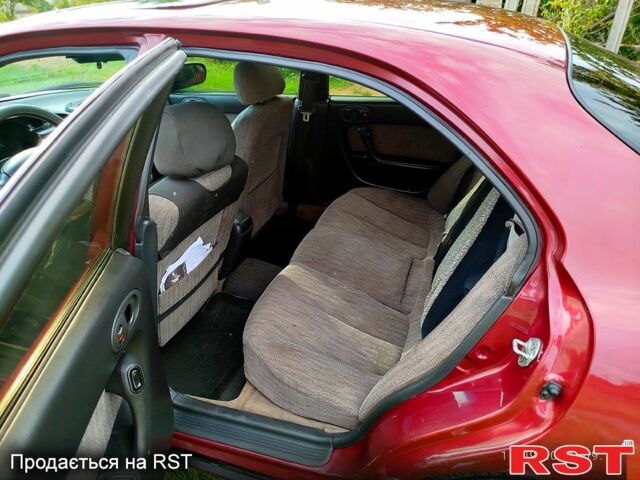 Красный Мазда Кседос 6, объемом двигателя 1.6 л и пробегом 265 тыс. км за 2500 $, фото 8 на Automoto.ua