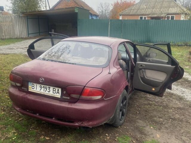 Красный Мазда Кседос 6, объемом двигателя 2 л и пробегом 350 тыс. км за 1200 $, фото 3 на Automoto.ua