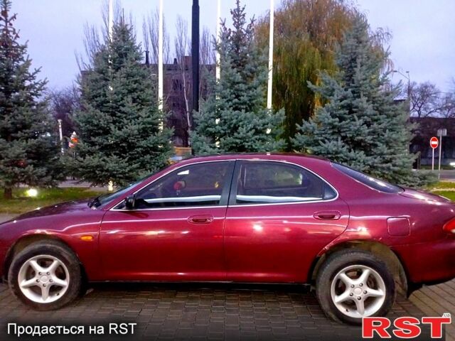 Красный Мазда Кседос 6, объемом двигателя 1.6 л и пробегом 265 тыс. км за 2500 $, фото 1 на Automoto.ua