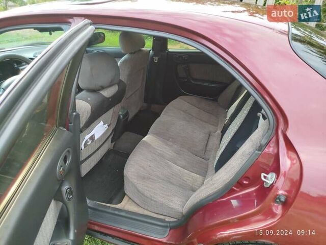 Червоний Мазда Кседос 6, об'ємом двигуна 1.6 л та пробігом 265 тис. км за 2500 $, фото 7 на Automoto.ua
