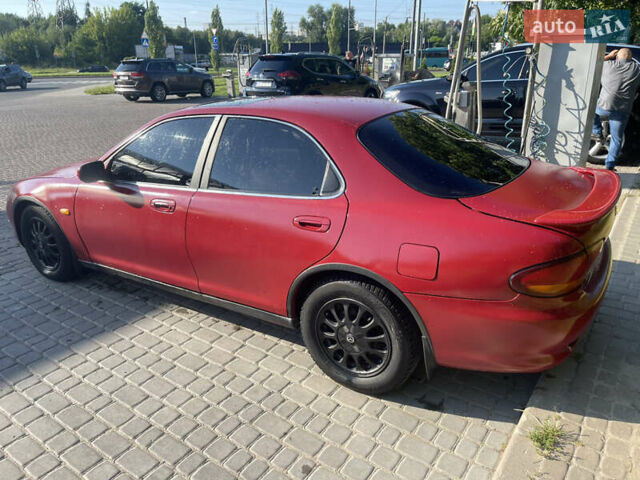 Червоний Мазда Кседос 6, об'ємом двигуна 2 л та пробігом 300 тис. км за 2200 $, фото 4 на Automoto.ua