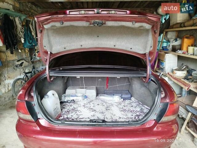 Червоний Мазда Кседос 6, об'ємом двигуна 1.6 л та пробігом 265 тис. км за 2500 $, фото 10 на Automoto.ua