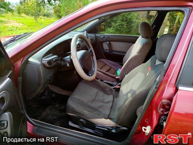 Красный Мазда Кседос 6, объемом двигателя 1.6 л и пробегом 265 тыс. км за 2500 $, фото 6 на Automoto.ua