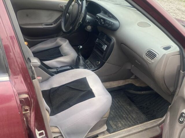 Красный Мазда Кседос 6, объемом двигателя 2 л и пробегом 350 тыс. км за 1200 $, фото 2 на Automoto.ua