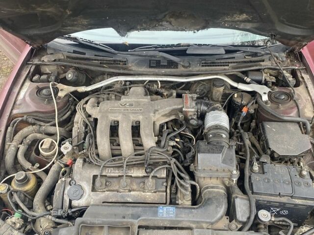 Красный Мазда Кседос 6, объемом двигателя 2 л и пробегом 350 тыс. км за 1200 $, фото 5 на Automoto.ua