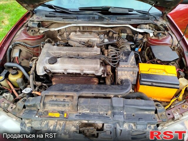 Красный Мазда Кседос 6, объемом двигателя 1.6 л и пробегом 265 тыс. км за 2500 $, фото 9 на Automoto.ua