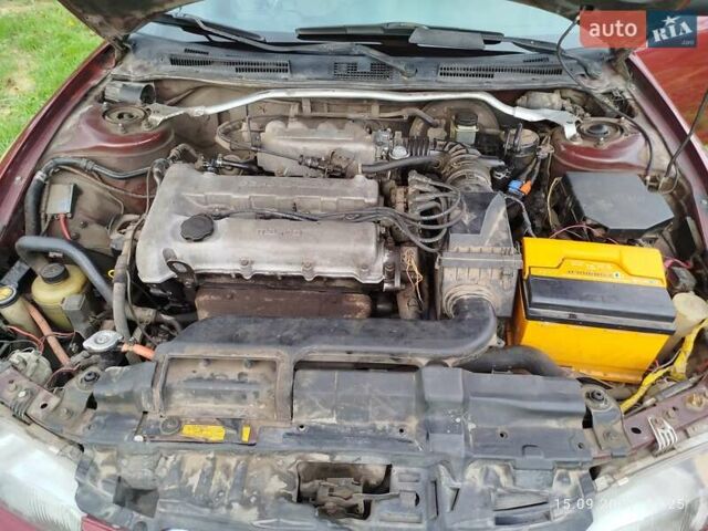 Червоний Мазда Кседос 6, об'ємом двигуна 1.6 л та пробігом 265 тис. км за 2500 $, фото 4 на Automoto.ua