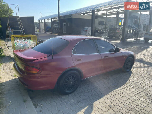 Червоний Мазда Кседос 6, об'ємом двигуна 2 л та пробігом 300 тис. км за 2200 $, фото 2 на Automoto.ua