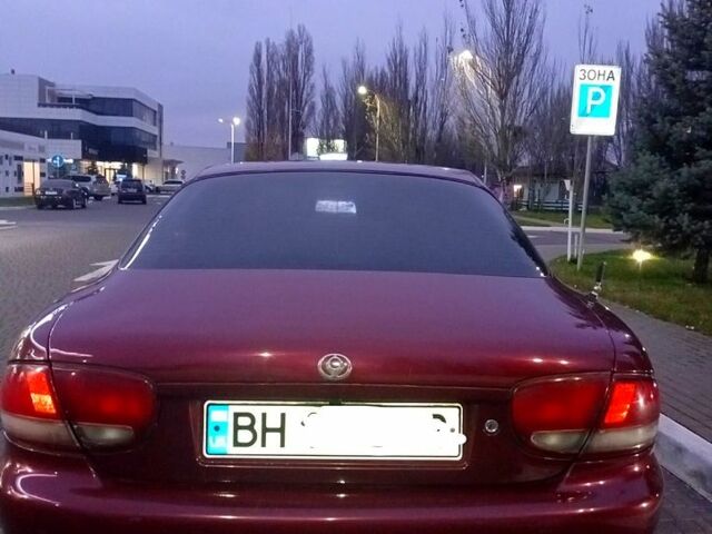 Красный Мазда Кседос 6, объемом двигателя 1.6 л и пробегом 265 тыс. км за 2500 $, фото 2 на Automoto.ua