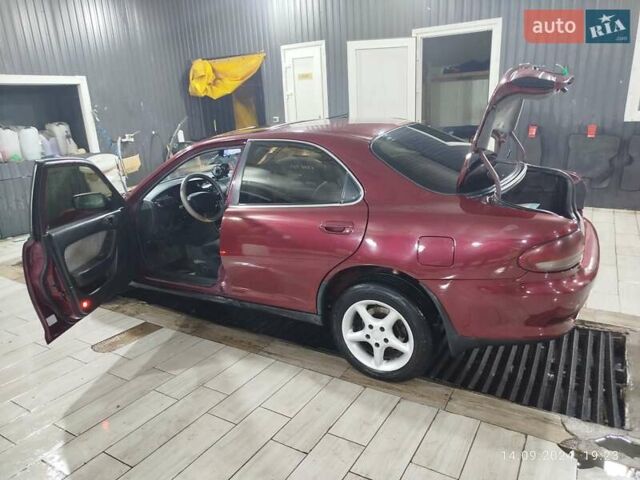 Червоний Мазда Кседос 6, об'ємом двигуна 1.6 л та пробігом 265 тис. км за 2500 $, фото 2 на Automoto.ua