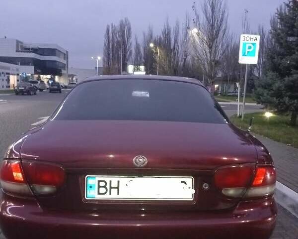 Червоний Мазда Кседос 6, об'ємом двигуна 1.6 л та пробігом 265 тис. км за 2500 $, фото 15 на Automoto.ua