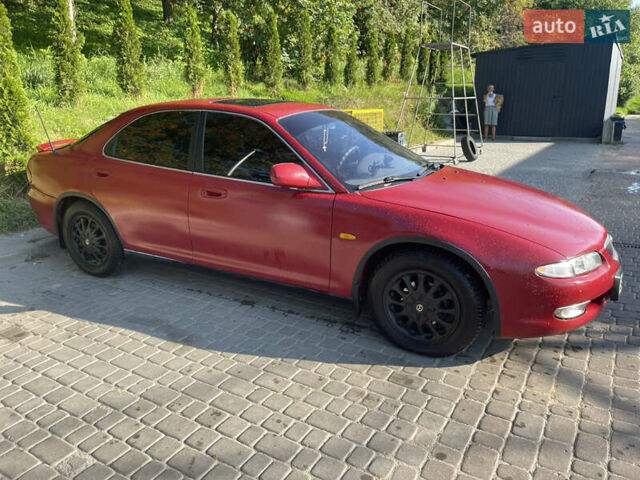Червоний Мазда Кседос 6, об'ємом двигуна 2 л та пробігом 300 тис. км за 2200 $, фото 1 на Automoto.ua