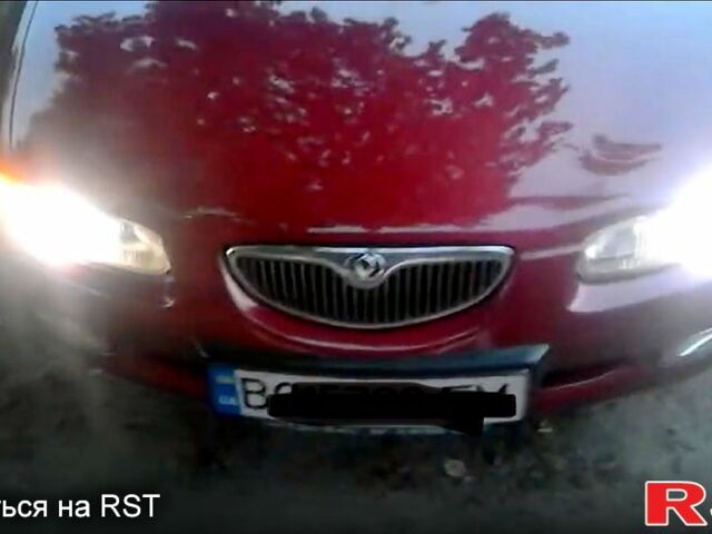 Червоний Мазда Кседос 6, об'ємом двигуна 2 л та пробігом 280 тис. км за 1500 $, фото 5 на Automoto.ua