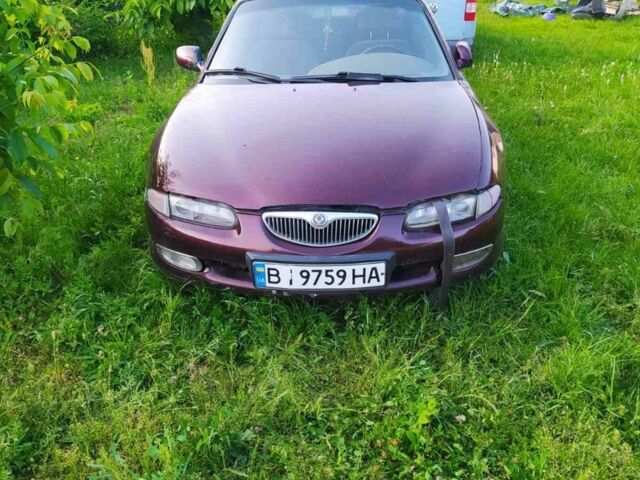 Червоний Мазда Кседос 6, об'ємом двигуна 2 л та пробігом 300 тис. км за 850 $, фото 3 на Automoto.ua