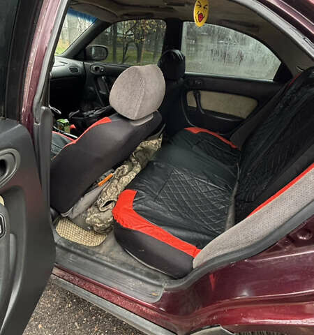 Красный Мазда Кседос 6, объемом двигателя 2 л и пробегом 260 тыс. км за 2800 $, фото 5 на Automoto.ua