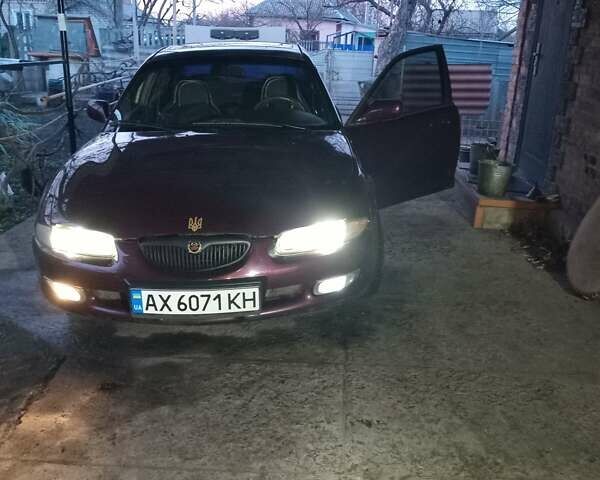 Червоний Мазда Кседос 6, об'ємом двигуна 2 л та пробігом 280 тис. км за 2800 $, фото 12 на Automoto.ua