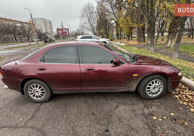 Красный Мазда Кседос 6, объемом двигателя 2 л и пробегом 260 тыс. км за 2800 $, фото 1 на Automoto.ua