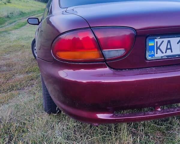 Червоний Мазда Кседос 6, об'ємом двигуна 2 л та пробігом 280 тис. км за 2900 $, фото 11 на Automoto.ua