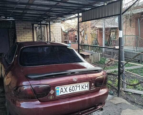 Червоний Мазда Кседос 6, об'ємом двигуна 2 л та пробігом 280 тис. км за 2800 $, фото 7 на Automoto.ua