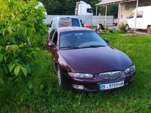 Червоний Мазда Кседос 6, об'ємом двигуна 2 л та пробігом 300 тис. км за 850 $, фото 1 на Automoto.ua