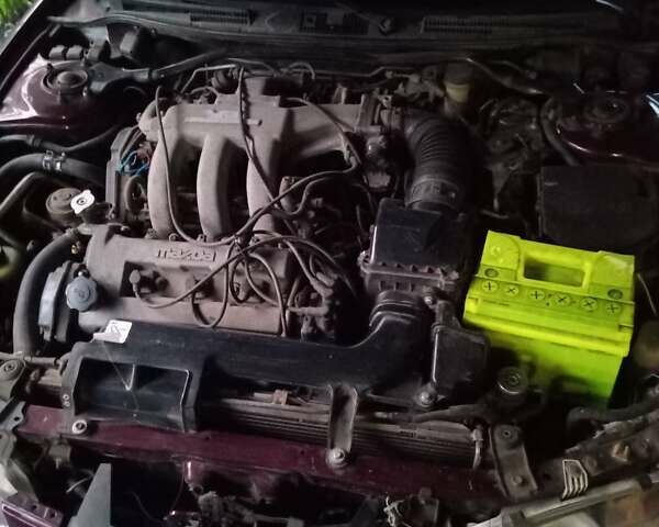 Червоний Мазда Кседос 6, об'ємом двигуна 2 л та пробігом 280 тис. км за 2800 $, фото 3 на Automoto.ua