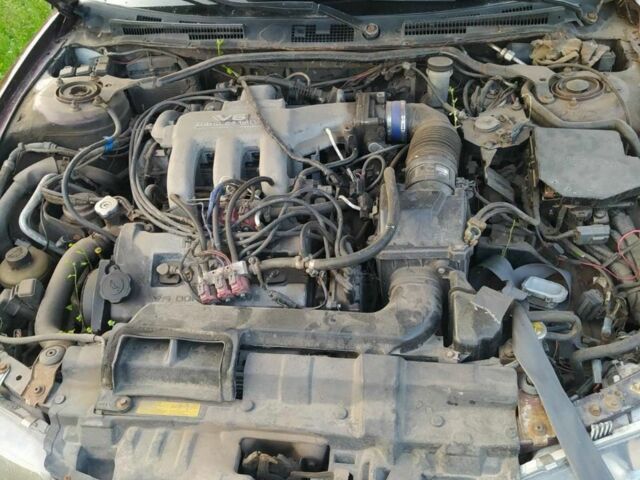 Червоний Мазда Кседос 6, об'ємом двигуна 2 л та пробігом 300 тис. км за 850 $, фото 6 на Automoto.ua